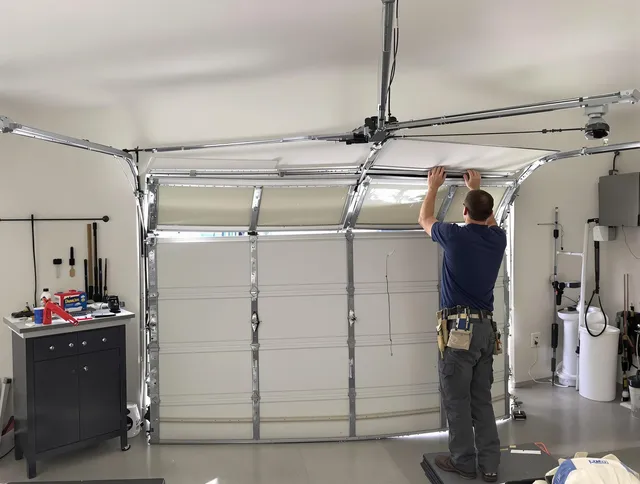 Brandon Garage Door Repair specialist performing precise section replacement on Brandon garage door