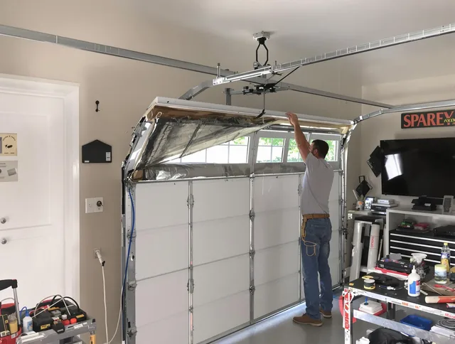 Garage door section replacement by Brandon Garage Door Repair in Brandon