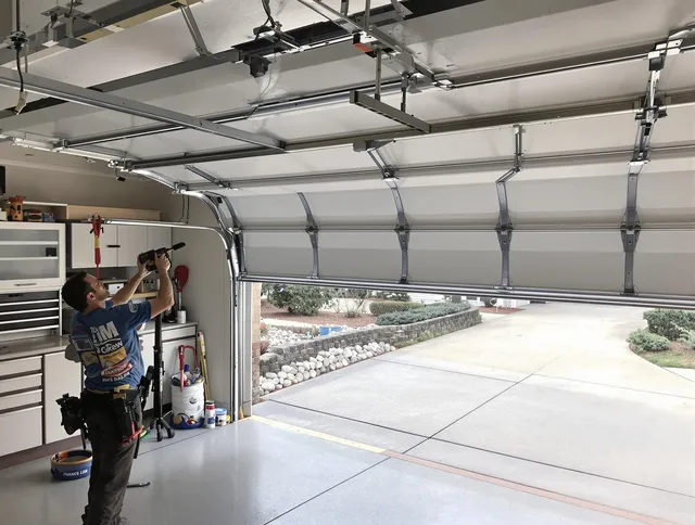 Garage door track repair service by Brandon Garage Door Repair in Brandon